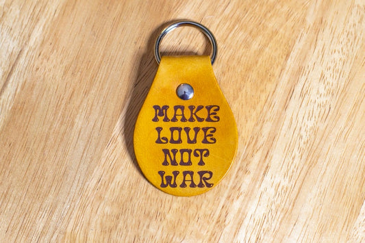 Make Love Not War Leather Keychain