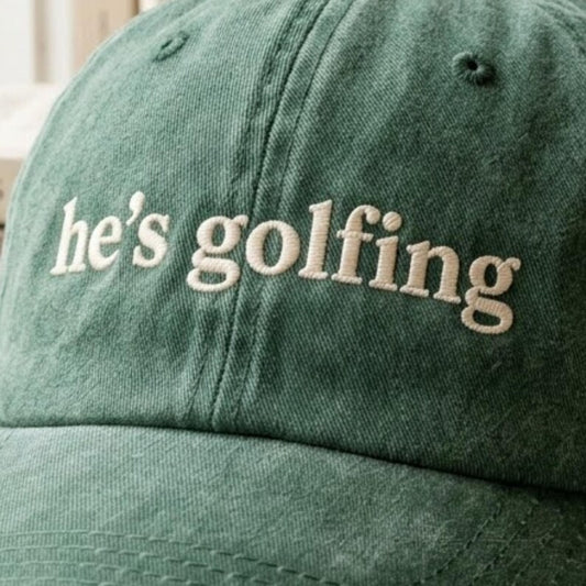 Embroidered He's Golfing Hat, Golf Dad Cap, Golfer Wife Gift