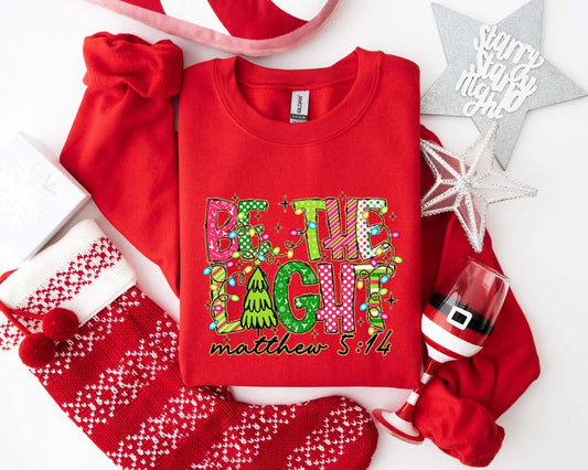 Be The Light Christmas Sweatshirt, Religious Christmas Shirt, Christmas Shirt for Women, Christmas Gift, Bible Verse Sweatshirt