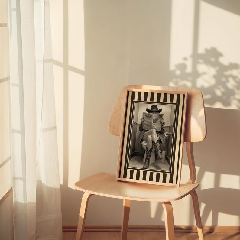 Funny Bathroom Cowgirl Wall Art Photo, Female Cowboy with Boots Reading Newspaper on Toilet, Quirky Restroom Decor, Humorous Loo Sign Print